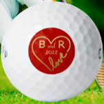 Valentine’s Day Love Wins Golf Balls<br><div class="desc">This lovely design features a heart -- with love -- Monograms.   Designed for Valentine's Day,  it could be true any day of the week.   Any design questions or special requests,  just email: charmdesignstudio@rcn.com and we'll be happy to assist.</div>