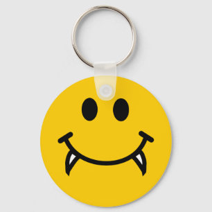 Vampire smiley face with fangs keychain