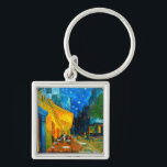 Van Gogh Café Terrace at Night Keychain<br><div class="desc">Keychain featuring Vincent van Gogh’s oil painting Café Terrace at Night (1888). Yellow stars paint the blue night sky above an outdoor café in France. A marvellous gift for fans of Post-Impressionism and Dutch art.</div>