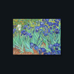 Van Gogh Classic Painting Irises Floral Botanical Canvas Print<br><div class="desc">Van Gogh’s Irises (1889) is a vibrant post-Impressionist masterpiece created during his stay at the Saint-Paul-de-Mausole asylum in Saint-Rémy-de-Provence. The painting captures a profusion of purple irises in full bloom, their petals rendered with bold, swirling brushstrokes and rich blue hues that evoke movement and energy. A single white blossom stands...</div>