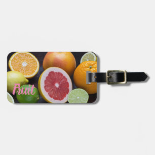 Variation of citrus orange, lime, mandarin, luggage tag