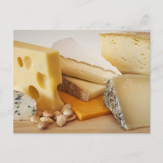 Various cheeses on chopping board postcard (Front)
