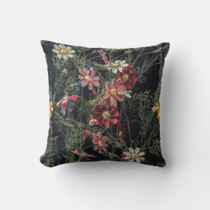 Various flowers on the black wooden background. Ab Throw Pillow