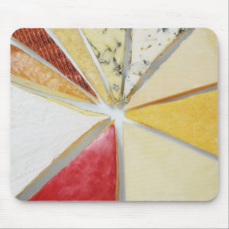 Various pieces of cheese resembling a pie chat mouse pad