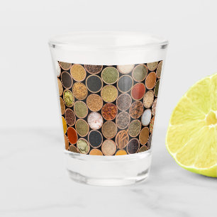 Various spices and food ingredients shot glass