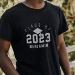 Varsity Style Graduate Class of 2022 Custom Name T-Shirt<br><div class="desc">Fun varsity-style grad t-shirt featuring the graduation year in large numbers with the "class of" displayed in an arch design above. A grad cap and tassel are placed in the centre and personalized with the grad's name. Makes a great personalized keepsake gift for the grad.</div>