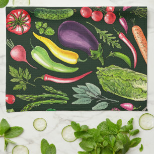 Vegetable and herbs garden harvest on black kitchen towel