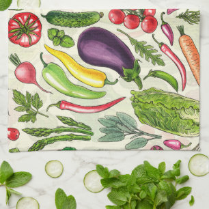 Vegetable and herbs garden harvest on off white kitchen towel