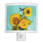 Vincent van Gogh trois tournesols dans un vase