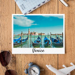 Venice Grand Canal with blue iconic gondolas Postcard<br><div class="desc">A wonderful view of Venice (Italy) and the Grand Canal. 
In this postcard,  you can see some blue elegant Gondolas,  the famous boat that is one of the most iconic symbols of Venice.</div>