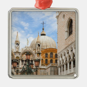 Venice, Veneto, Italy - Birds are perched on a Metal Ornament