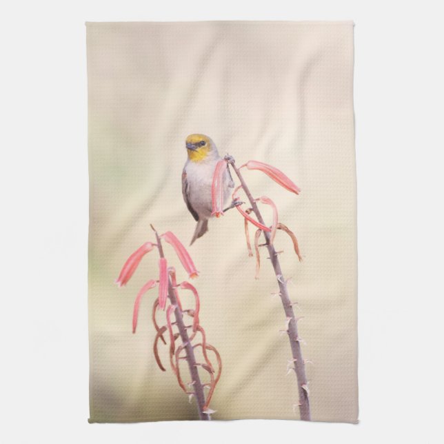 Verdin perched on penstemon kitchen towel (Vertical)