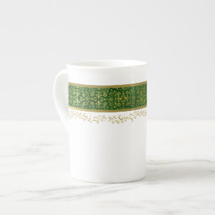 Vert de vacances et tasse de porcelaine tendre