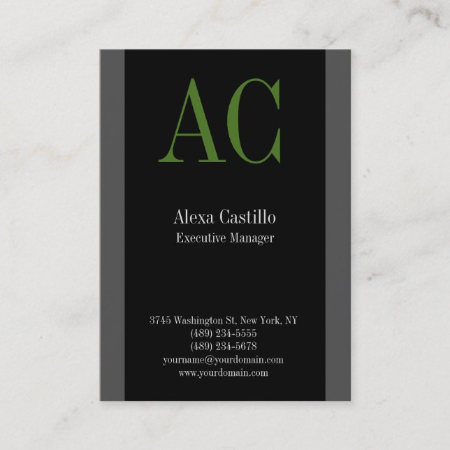 Vertical professional black grey green monogram business card (Front)