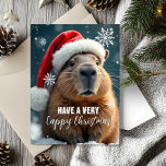 Very Cappy Christmas Capybara Christmas  Card<br><div class="desc">Send some Capy Christmas cheer this holiday season with this funny Christmas card featuring everyone’s favourite chill animal – the capybara! Decked out in a festive Santa hat and surrounded by snowflakes, this card brings an extra dose of humour to your holiday greetings. Perfect for adding a quirky touch to...</div>