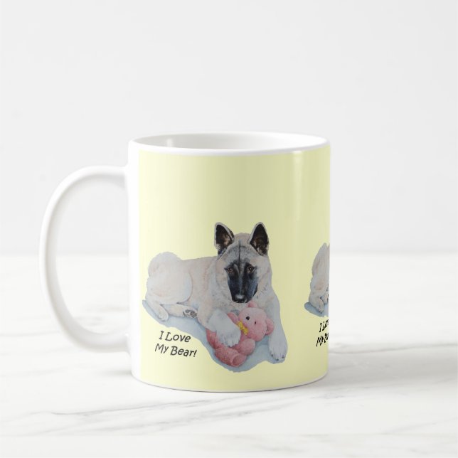 very cute akita with pink stuffie dog coffee mug (Left)