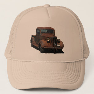 Very weathered '37 Chevy pick up on trucker cap