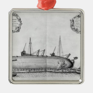 Vessel lying on its hull metal ornament