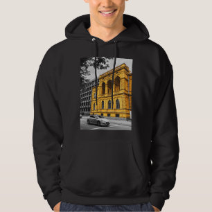 Veste À Capuche Immeuble de ville jaune Photographie minimaliste