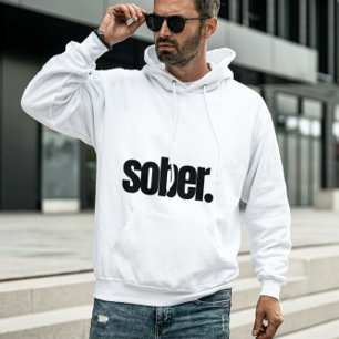 Veste À Capuche La sobriété audacieuse, un sobre confiant