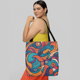 Vibrant abstract pattern with swirling shapes tote bag