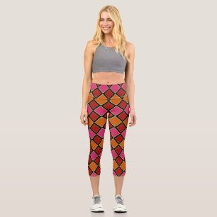 Vibrant Harlequin Diamond Pattern in Red, Orange, Capri Leggings