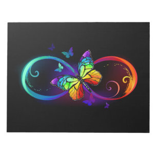Vibrant infinity with rainbow butterfly on black notepad