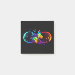 Vibrant infinity with rainbow butterfly on black post-it notes