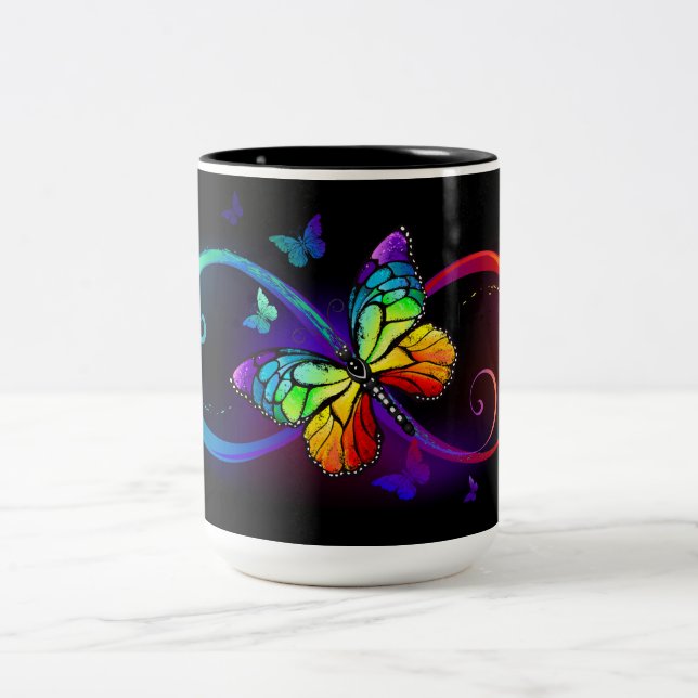 Vibrant infinity with rainbow butterfly on black Two-Tone coffee mug (Center)