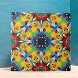 Vibrant Intricate Kaleidoscope Geometric Pattern Tile<br><div class="desc">This ceramic tile features a vibrant and intricate design. At the heart of the tile is a star-shaped pattern, rendered in bold shades of blue. This central motif is surrounded by radiant shapes in a striking yellow hue, adorned with delicate accents in red and green. The design is characterized by...</div>