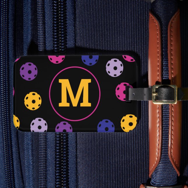 Vibrant pickleballs on black, custom initial  luggage tag (Front Insitu 4)