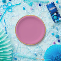 vibrant pink background with a golden rim