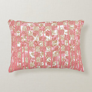 Vibrant pink fabric featuring intricate floral pat accent pillow