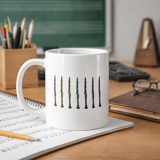 Vibrant Rainbow Clarinet Art Orchestra Band Music Coffee Mug (A mug with a line up of clarinets in red, orange, yellow, green, blue, purple and pink.)