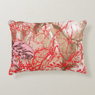 Vibrant red fabric design featuring intricate flor accent pillow
