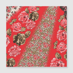 Vibrant red fabric featuring intricate floral and 