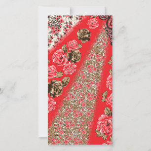 Vibrant red fabric featuring intricate floral and 