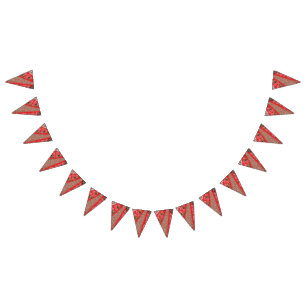 Vibrant red fabric featuring intricate floral and  bunting flags