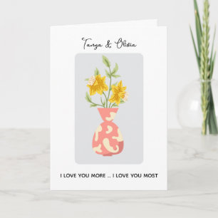 Vibrant yellow flower arrangement in a modern vase card