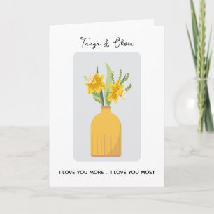 Vibrant yellow flower arrangement in a modern vase card