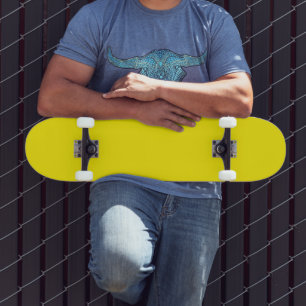 vibrant yellow skateboard features a clean
