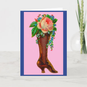 Victorian boot holding flowers card