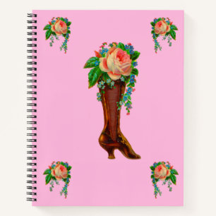 Victorian boot holding flowers notebook