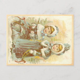Victorian girls going sledding postcard