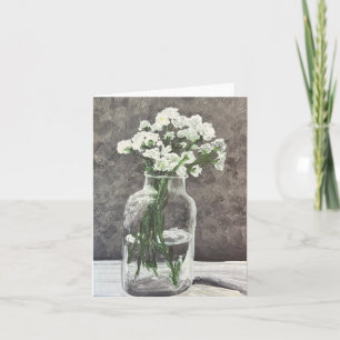 Vie morte : Fleurs blanches dans un pot transparen