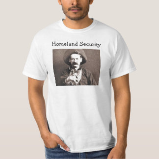 Vieux T-shirt occidental de sécurité de patrie de