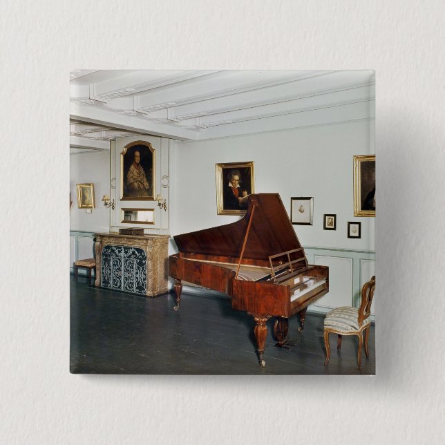 View of a room with a grand piano 2 inch square button (Front)