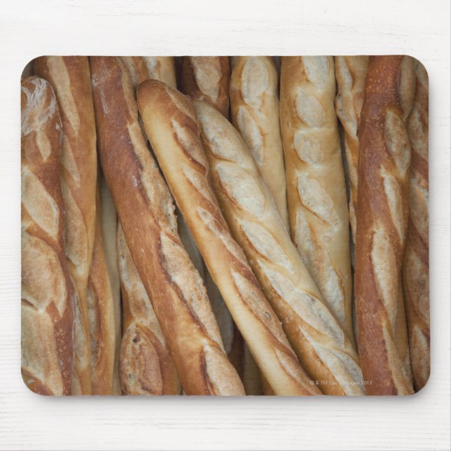 view of bread loaves in bakery window display mouse pad (Front)