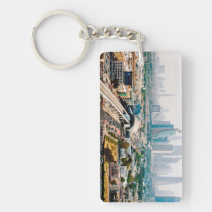 View of city metro line and skyscrapers keychain