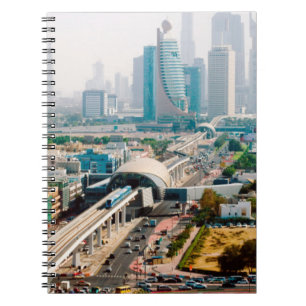 View of city metro line and skyscrapers notebook